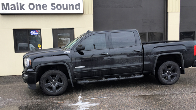 2017 GMC Sierra with professional window tint in North Bay